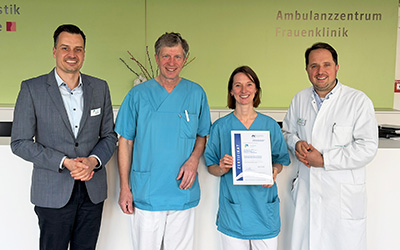 Teambild mit Zertifikat